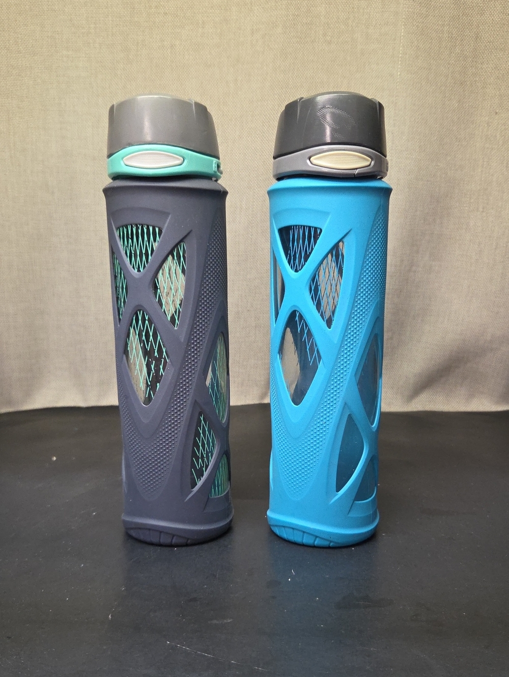 2 Zulu 20 oz Plastic Water Bottles BPA-Free, Lockable, Flip Lid, Silicone Sleeve